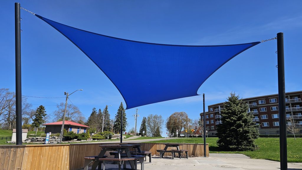 20240502_102540 Blue shade sail over Port Colborne lakeside public square Ontario